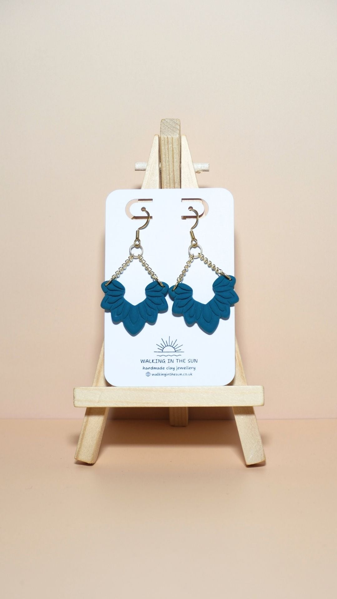 Handmade floral dangle with chains polymer clay earrings in ice blue
