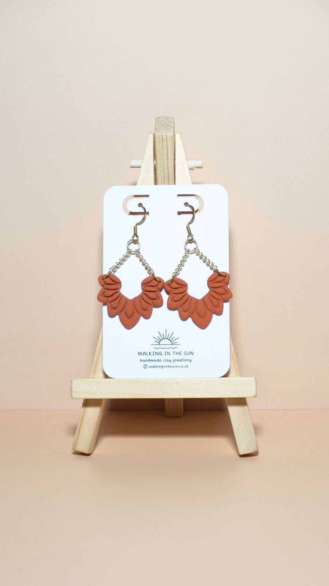 Handmade floral dangle with chains polymer clay earrings in sunny orange