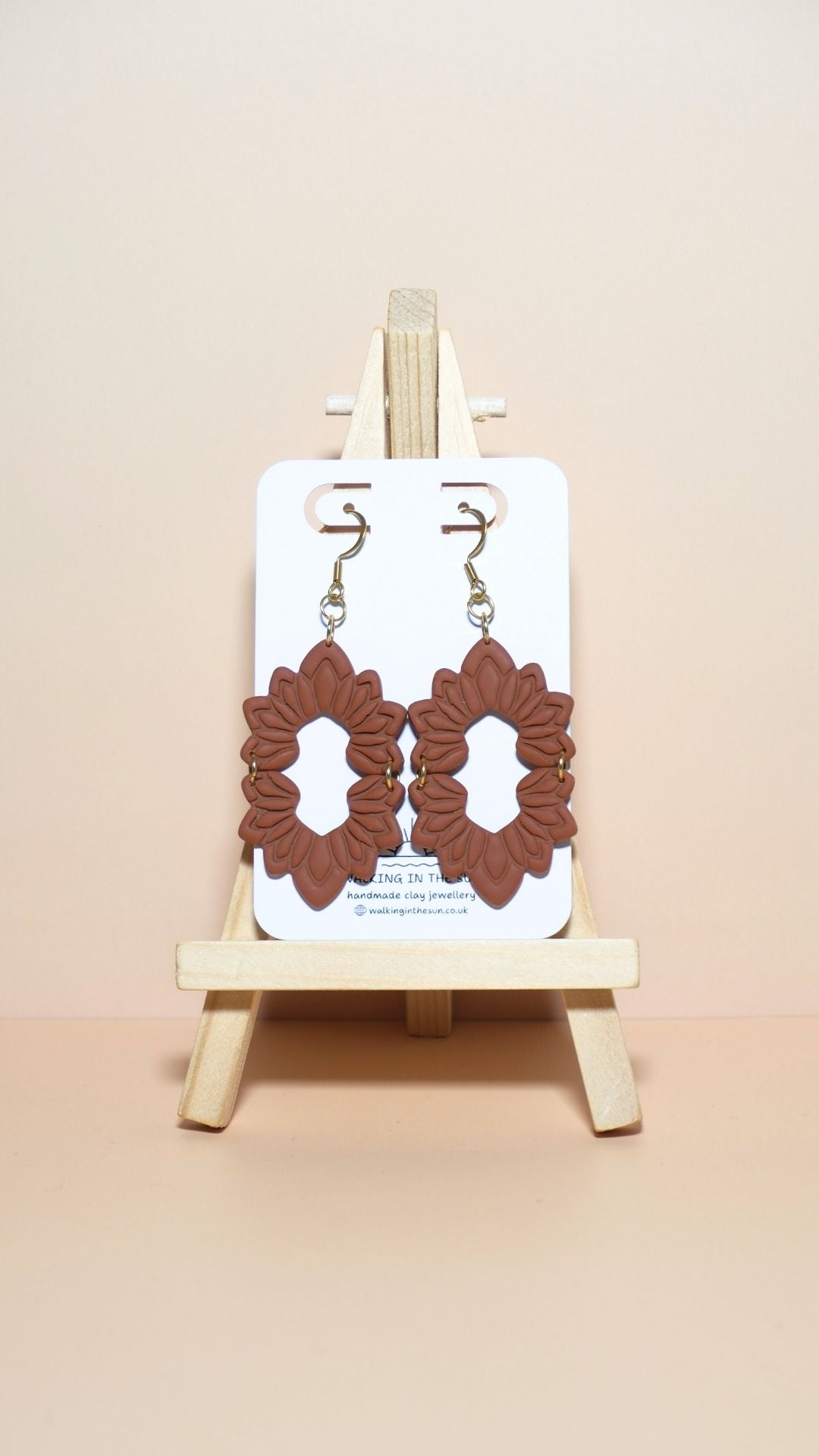 Handmade floral long dangle polymer clay earrings in burnt orange