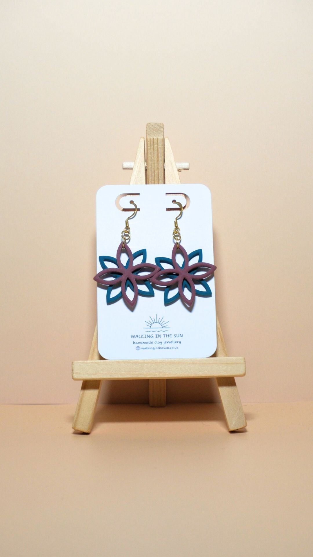 Handmade floral overlap polymer clay earrings in berry red and ice blue