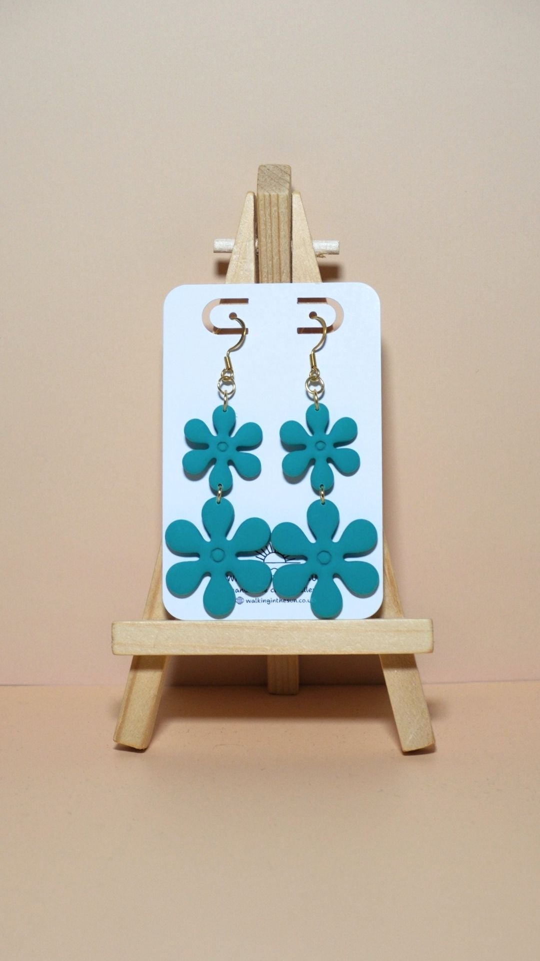 Handmade flower stack polymer clay earrings in sea blue