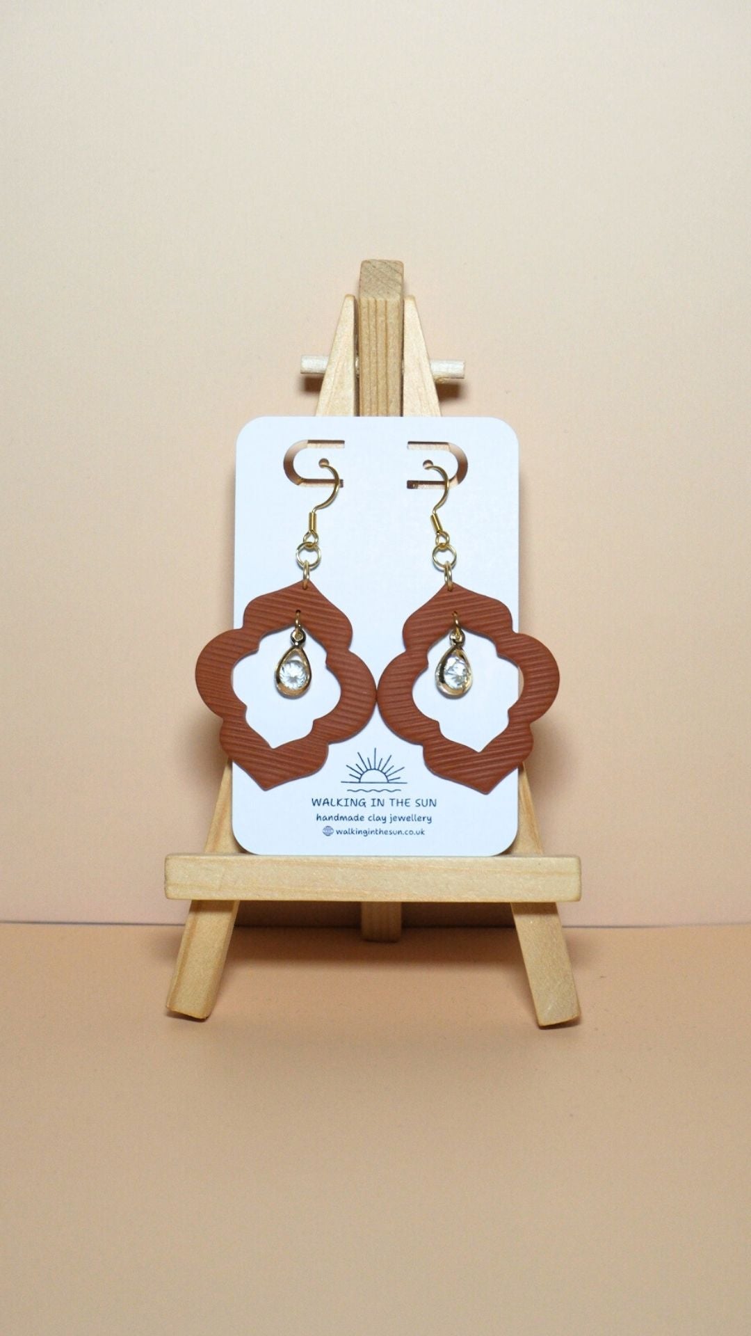 Handmade crystal drop frame polymer clay earrings in burnt orange