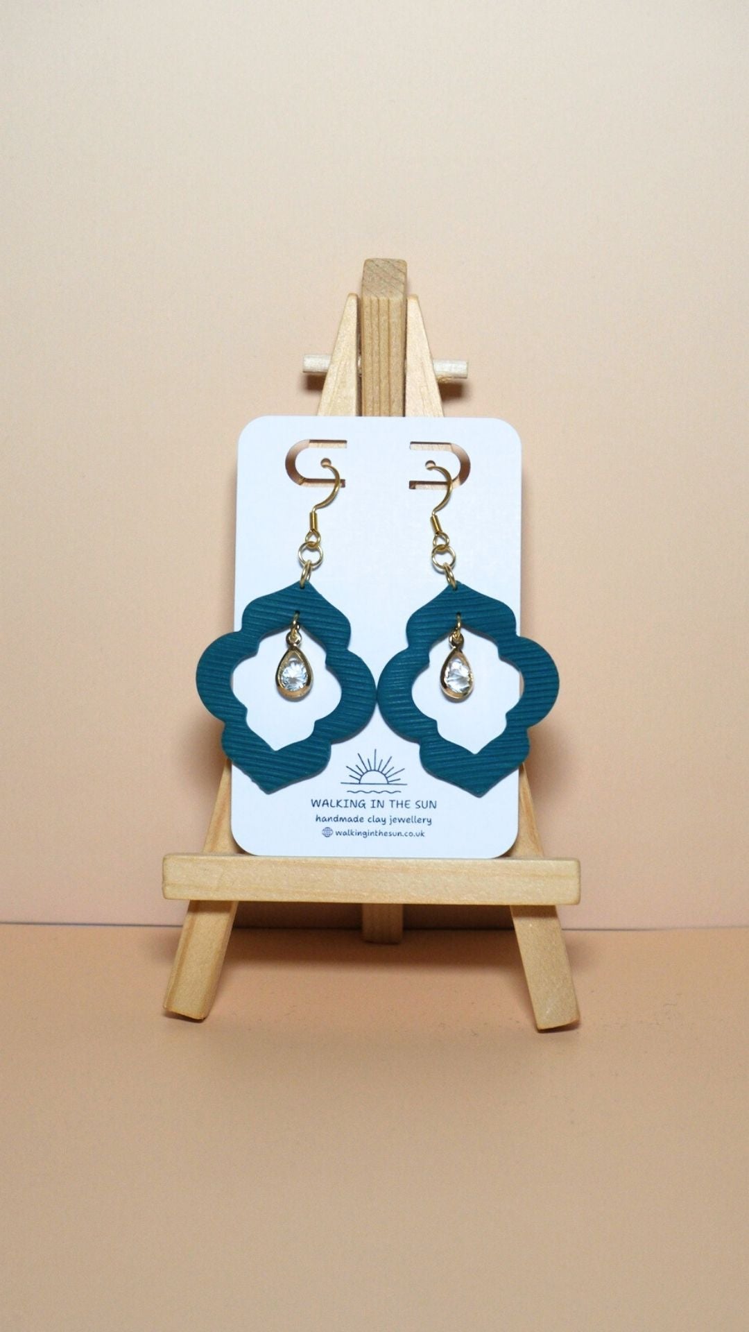 Handmade crystal drop frame polymer clay earrings in ice blue