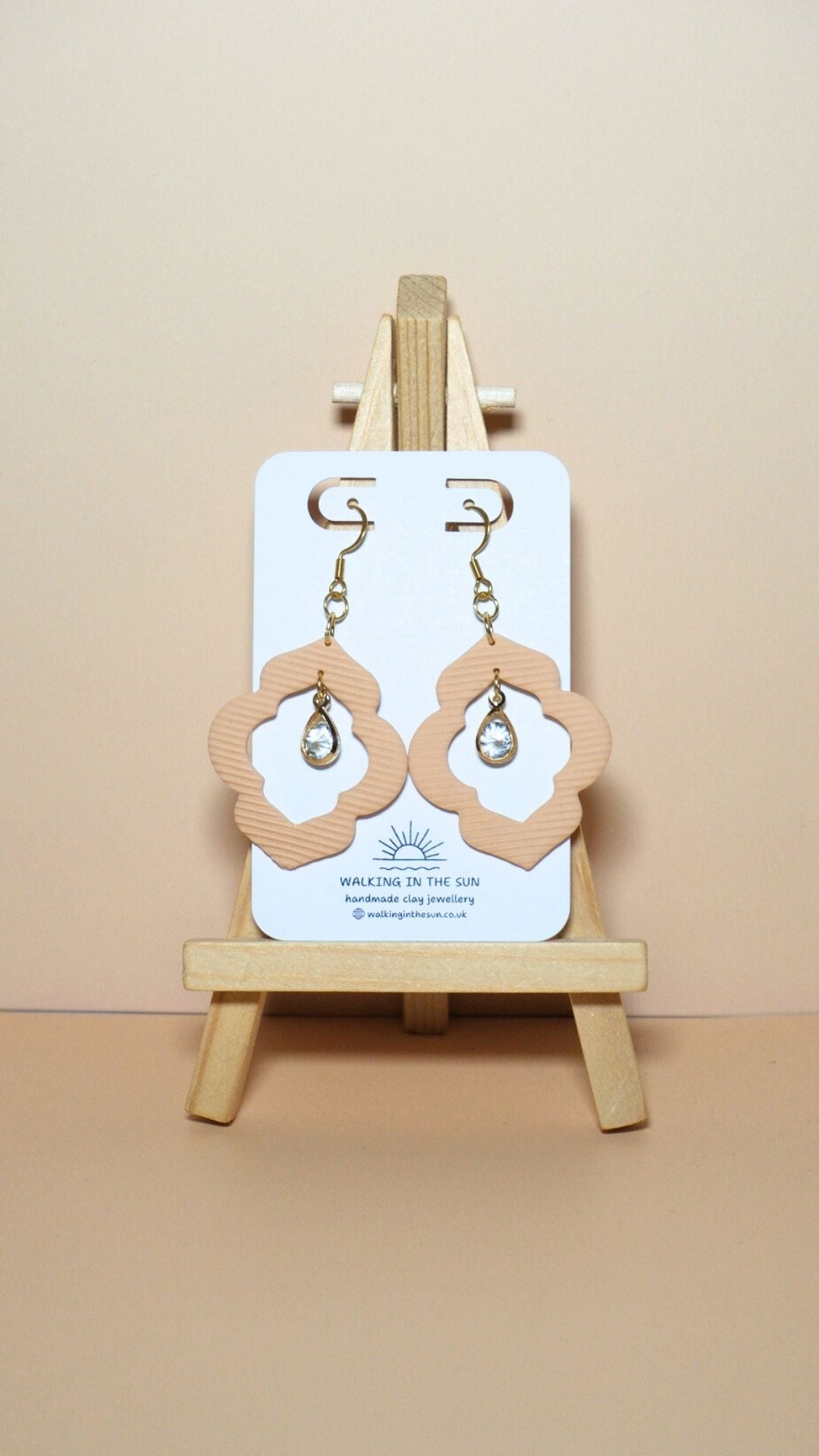 Handmade crystal drop frame polymer clay earrings in sandy beige