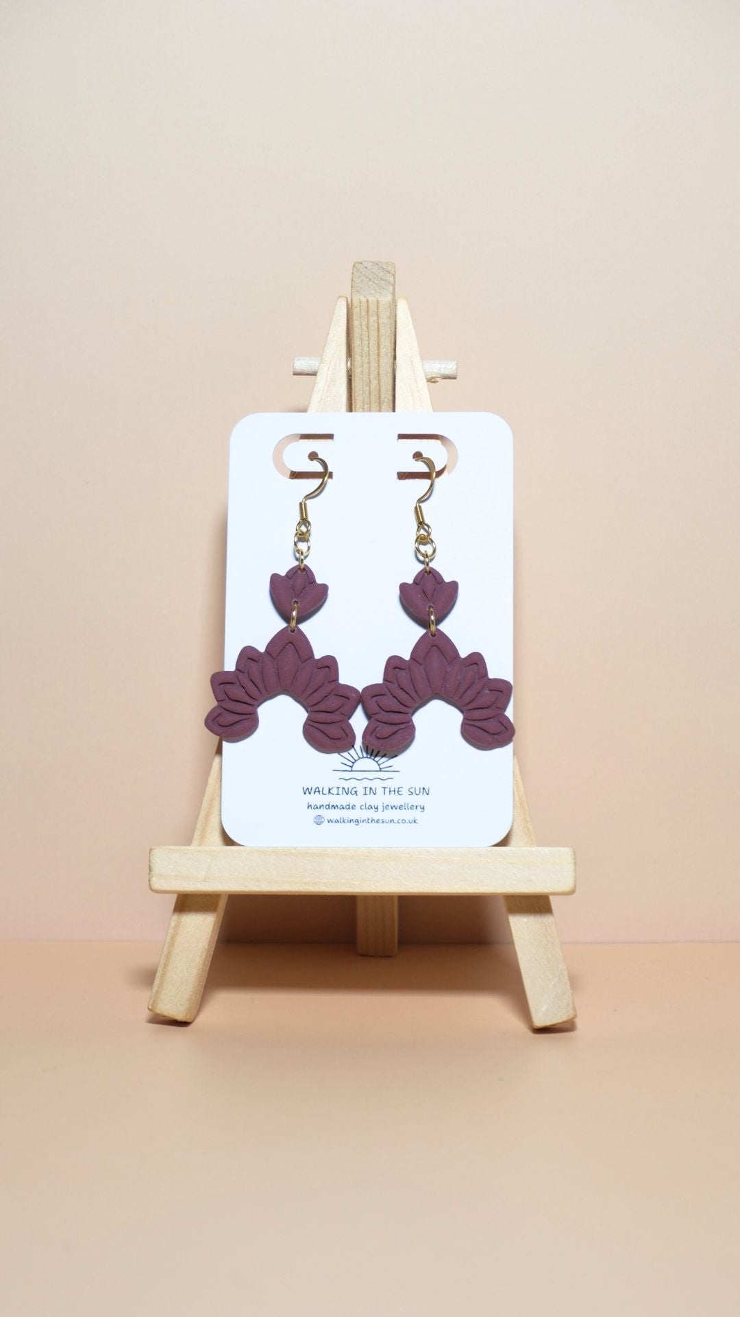 Handmade floral dangle polymer clay earrings in berry red