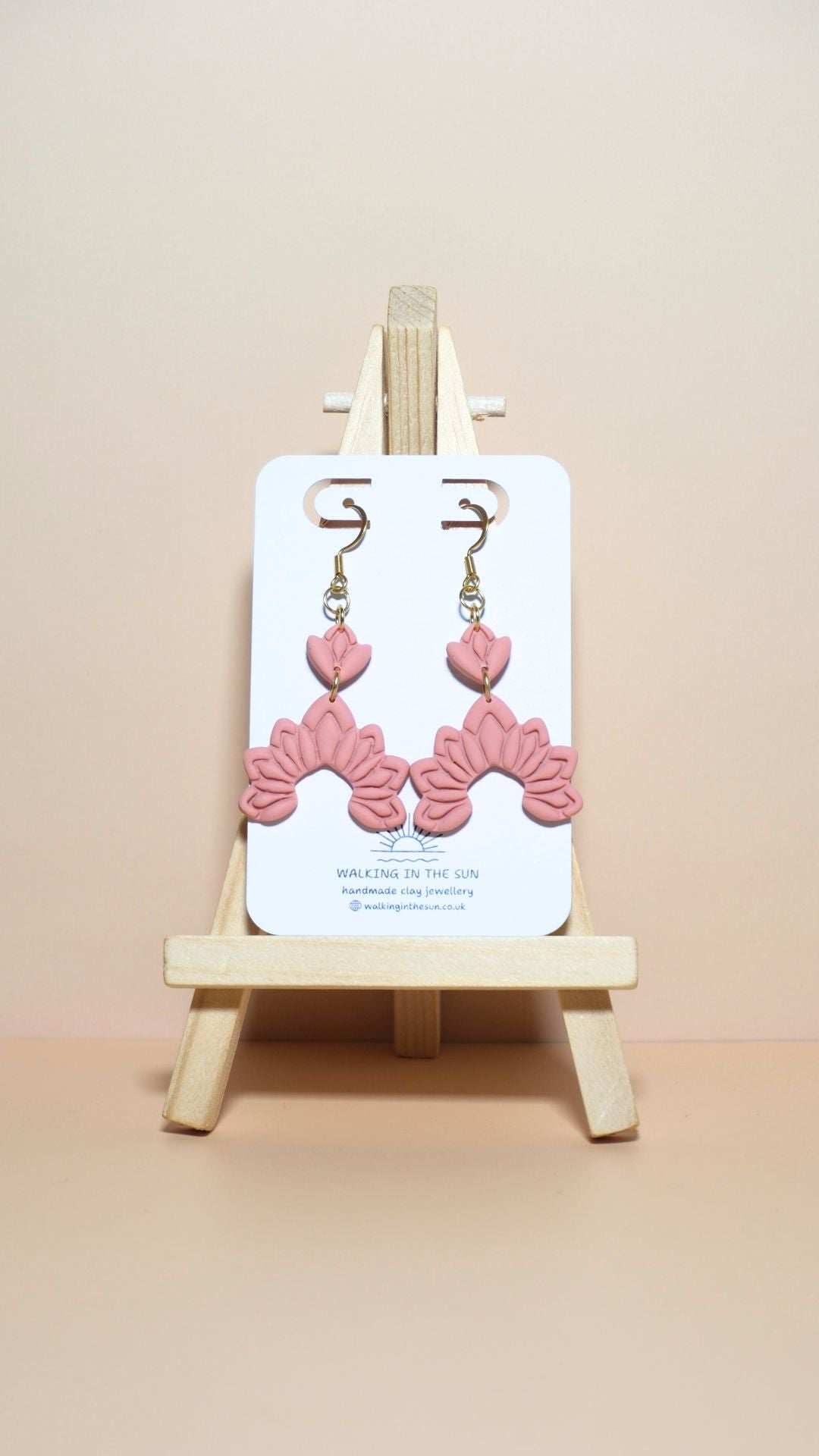 Handmade floral dangle polymer clay earrings in peach orange