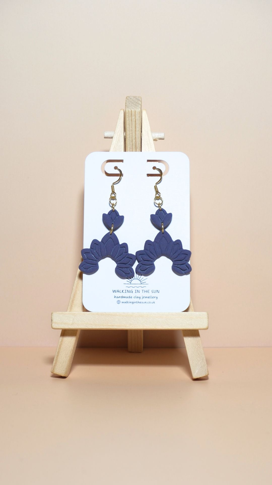 Handmade floral dangle polymer clay earrings in plum purple