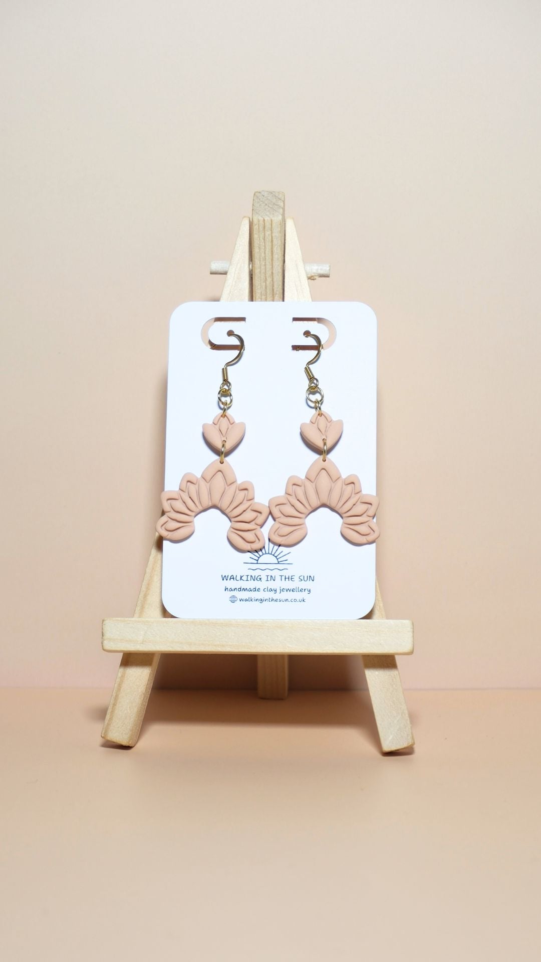 Handmade floral dangle polymer clay earrings in sandy beige