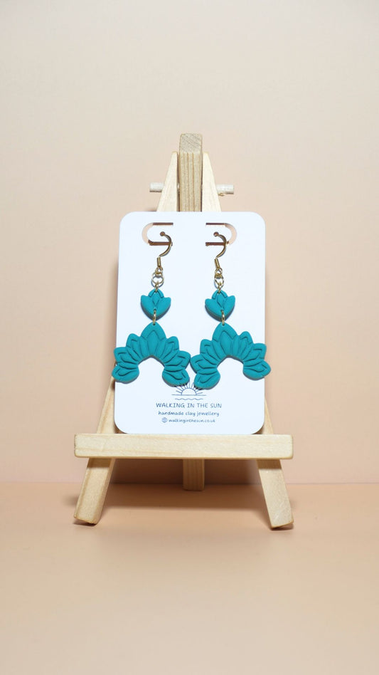 Handmade floral dangle polymer clay earrings in sea blue
