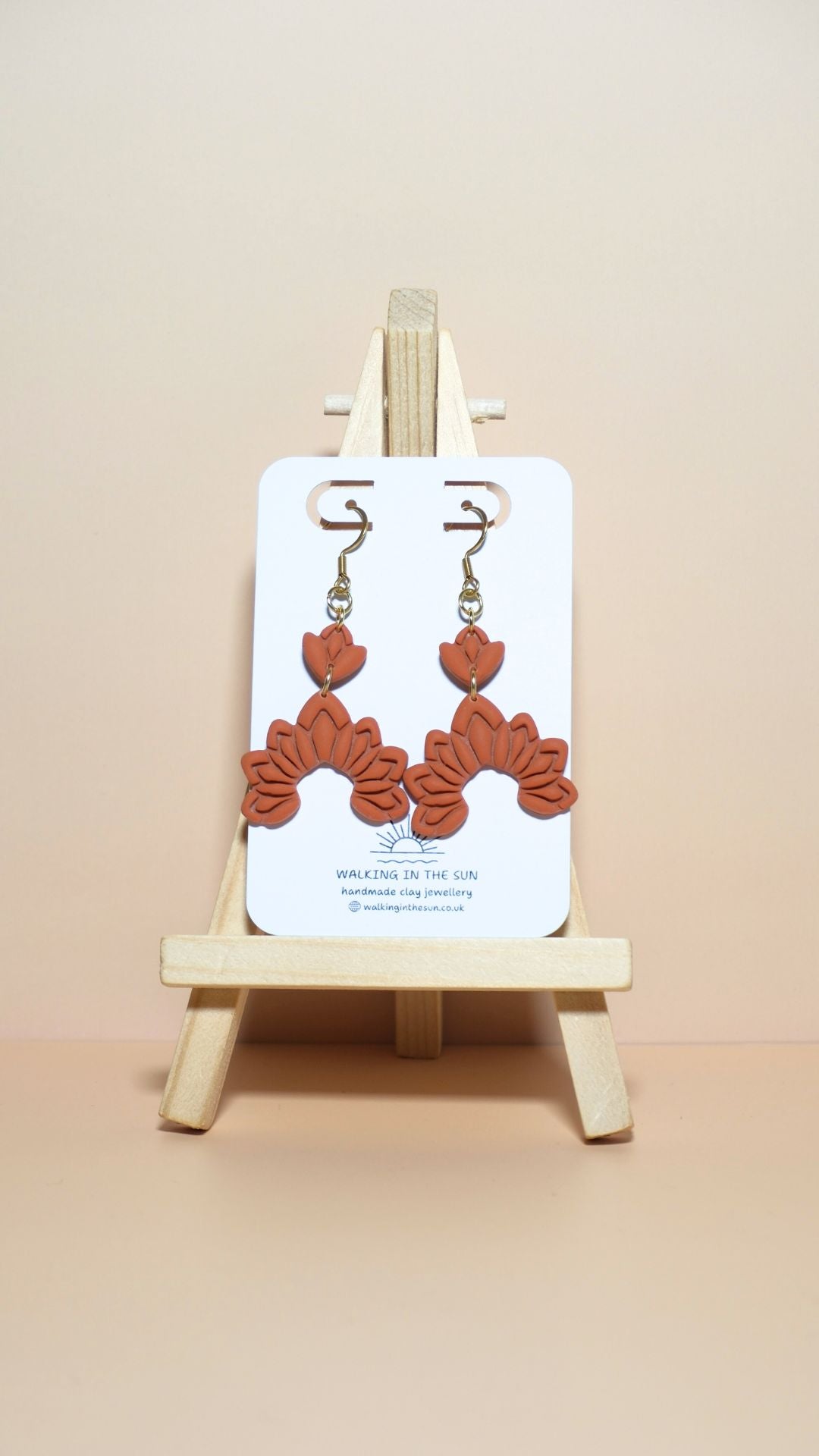 Handmade floral dangle polymer clay earrings in sunny orange