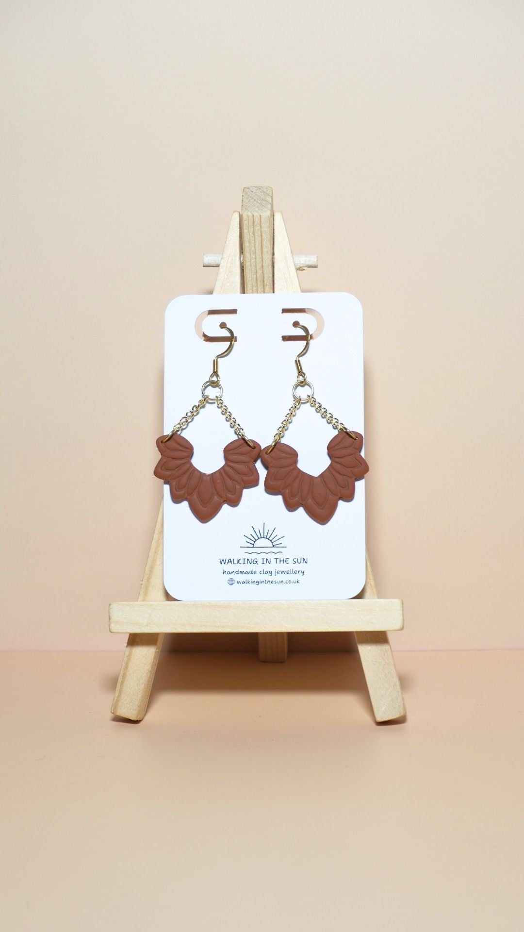Handmade floral dangle with chains polymer clay earrings in burnt orange