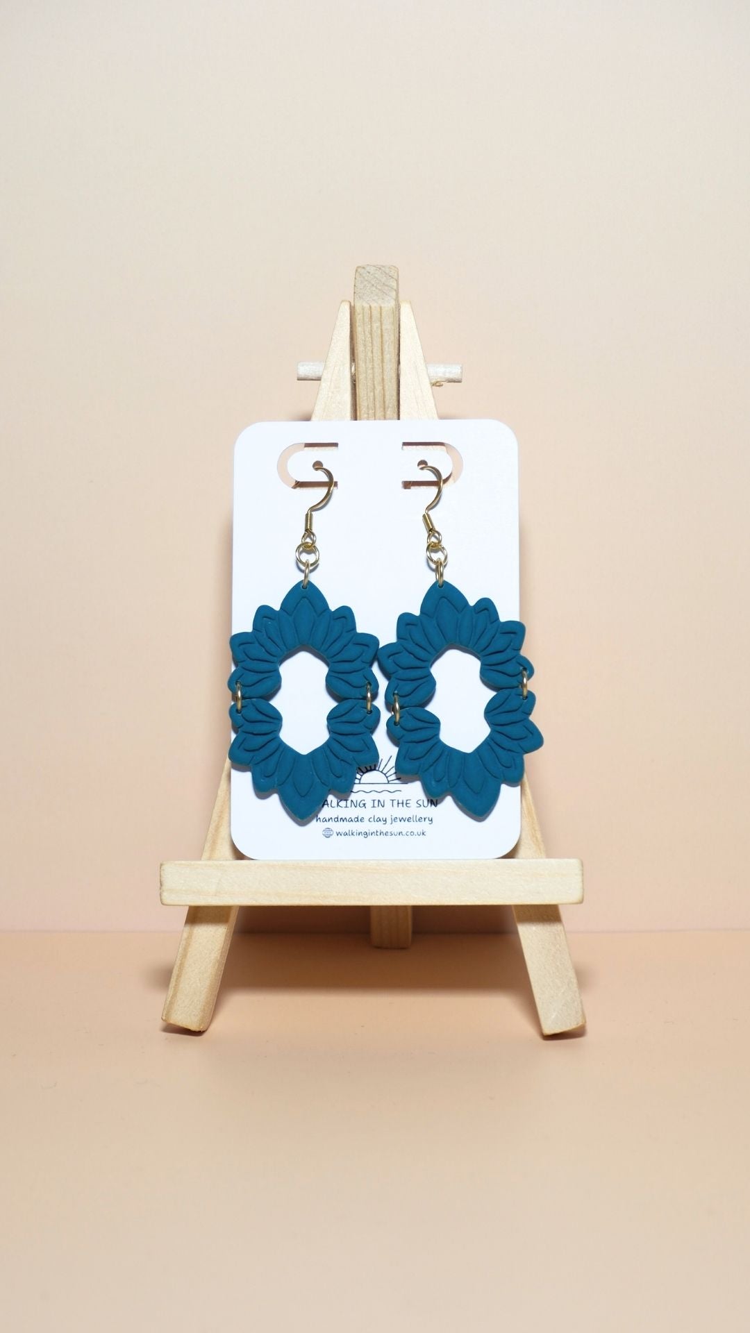 Handmade floral long dangle polymer clay earrings in ice blue