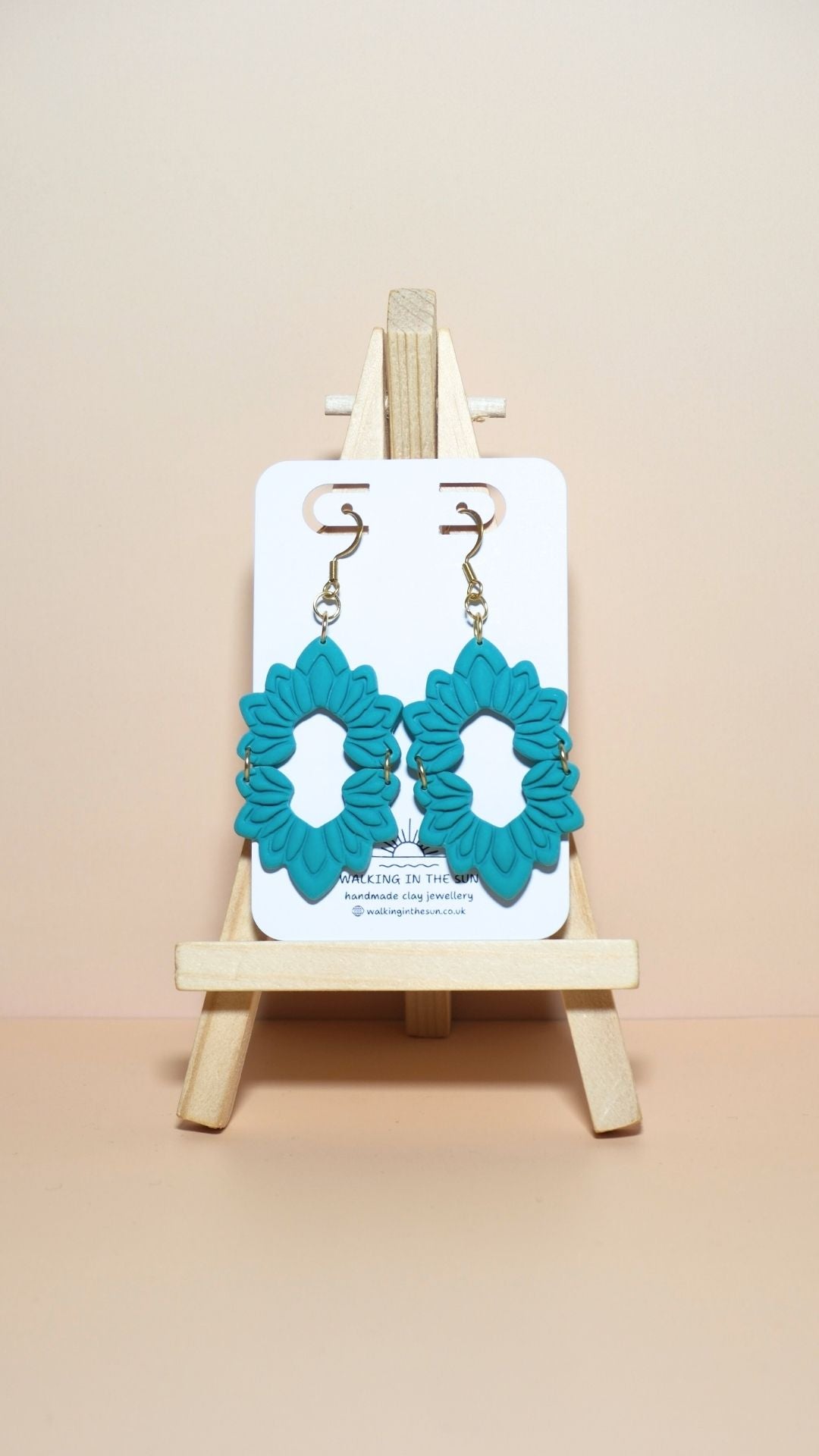 Handmade floral long dangle polymer clay earrings in sea blue