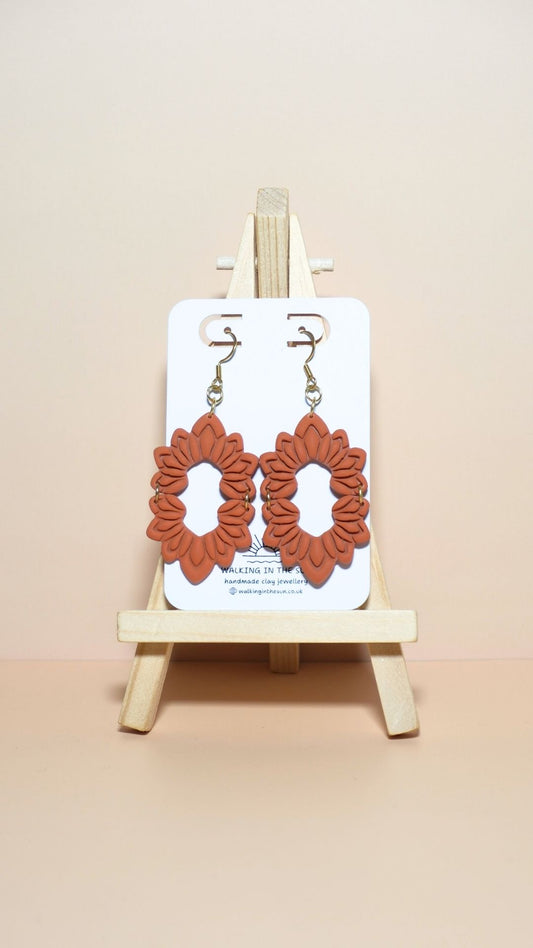 Handmade floral long dangle polymer clay earrings in sunny orange