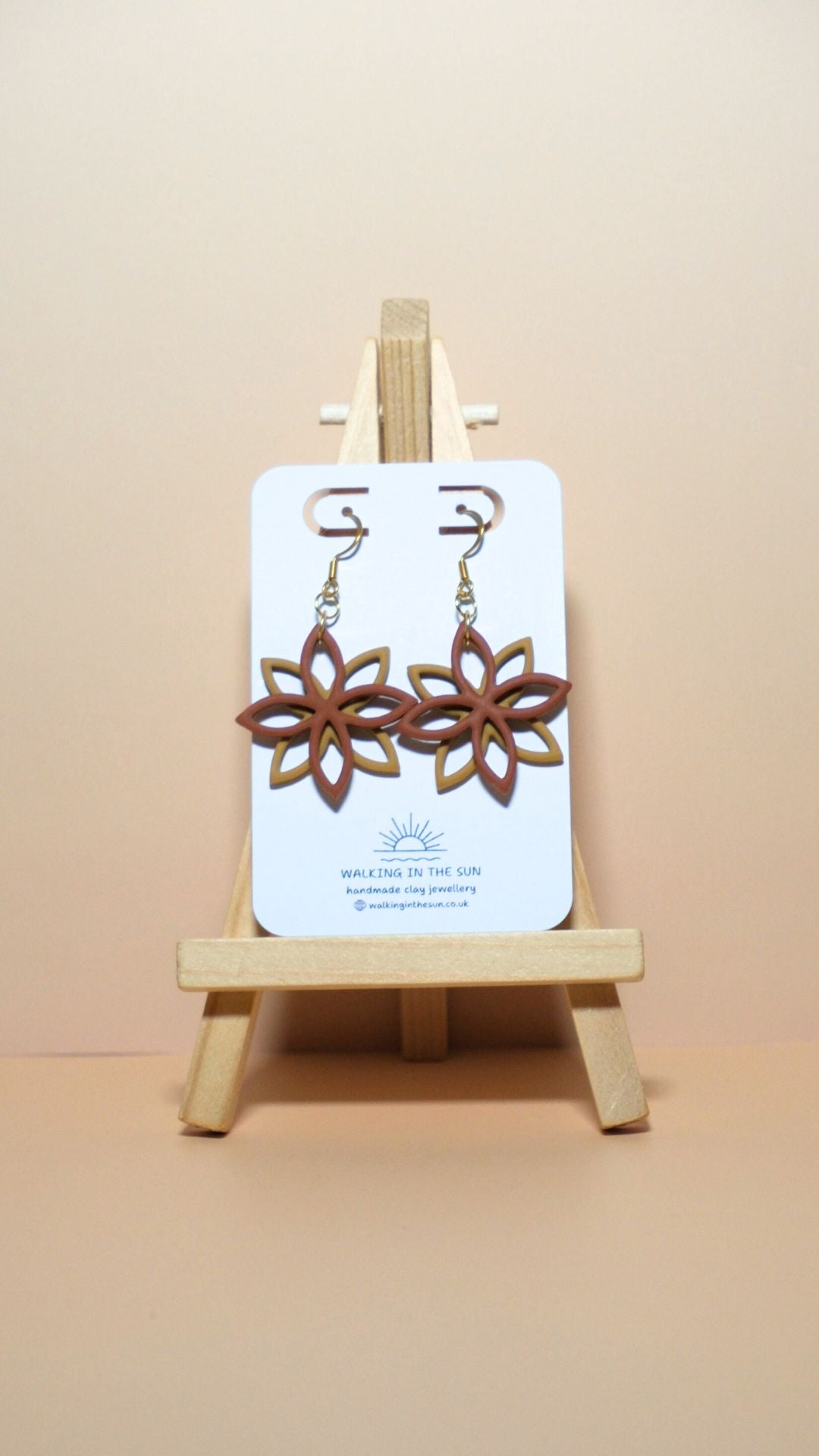 Handmade floral overlap polymer clay earrings in burnt orange and mustard yellow
