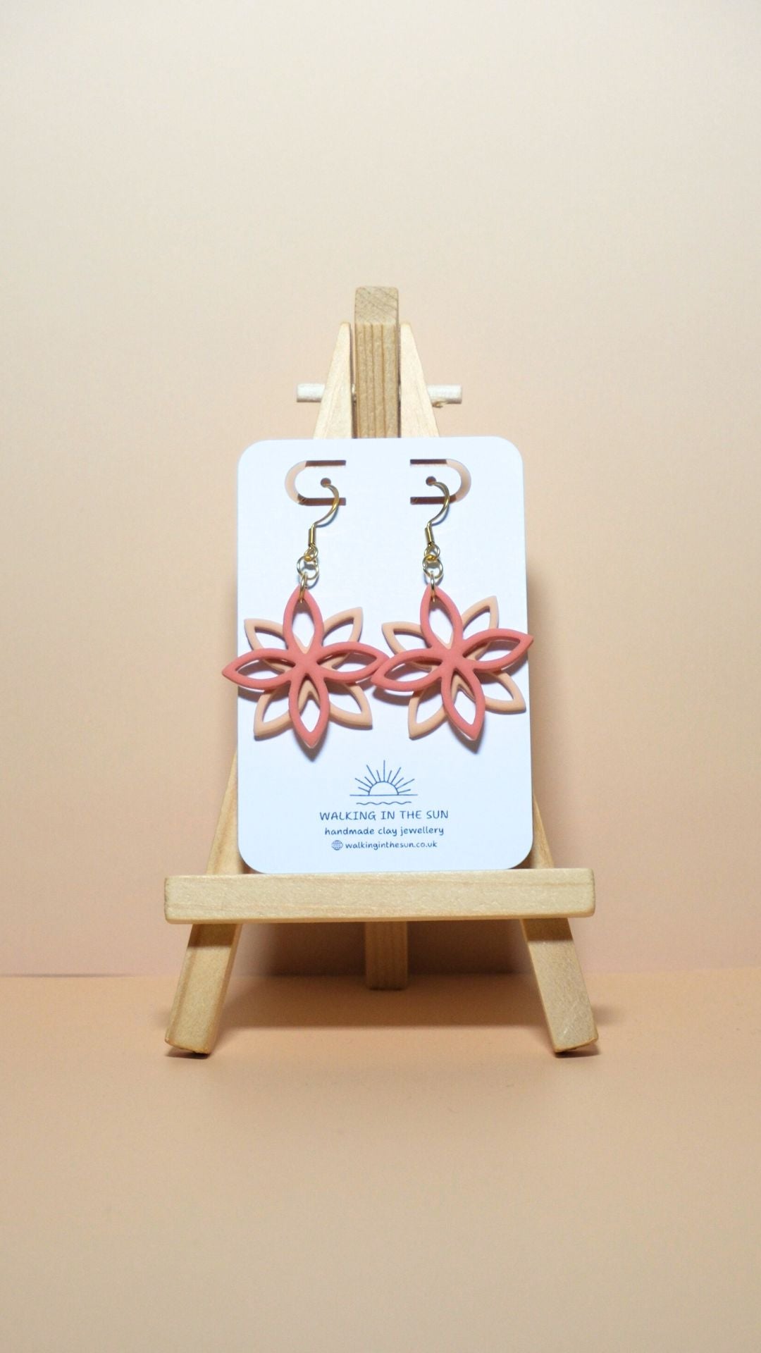 Handmade floral overlap polymer clay earrings in coral pink and sandy beige