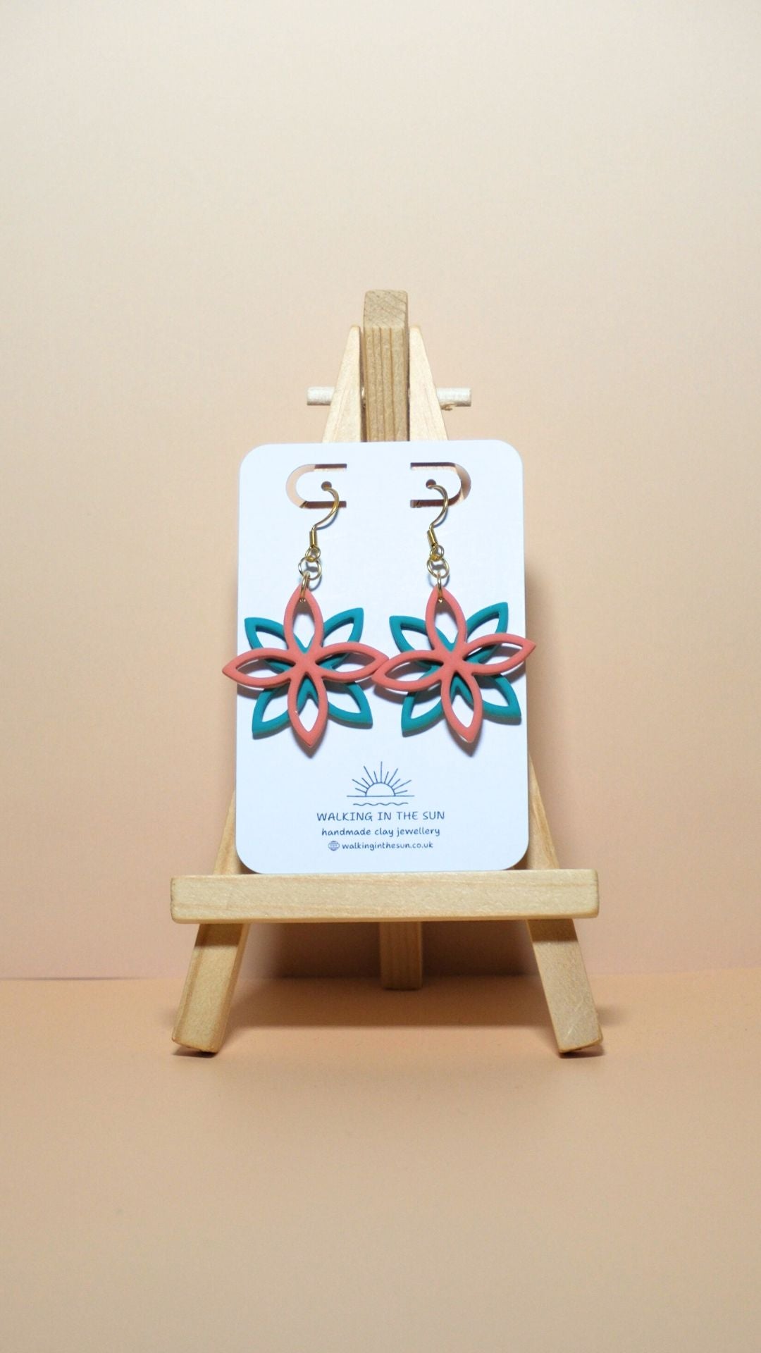 Handmade floral overlap polymer clay earrings in coral pink and sea blue