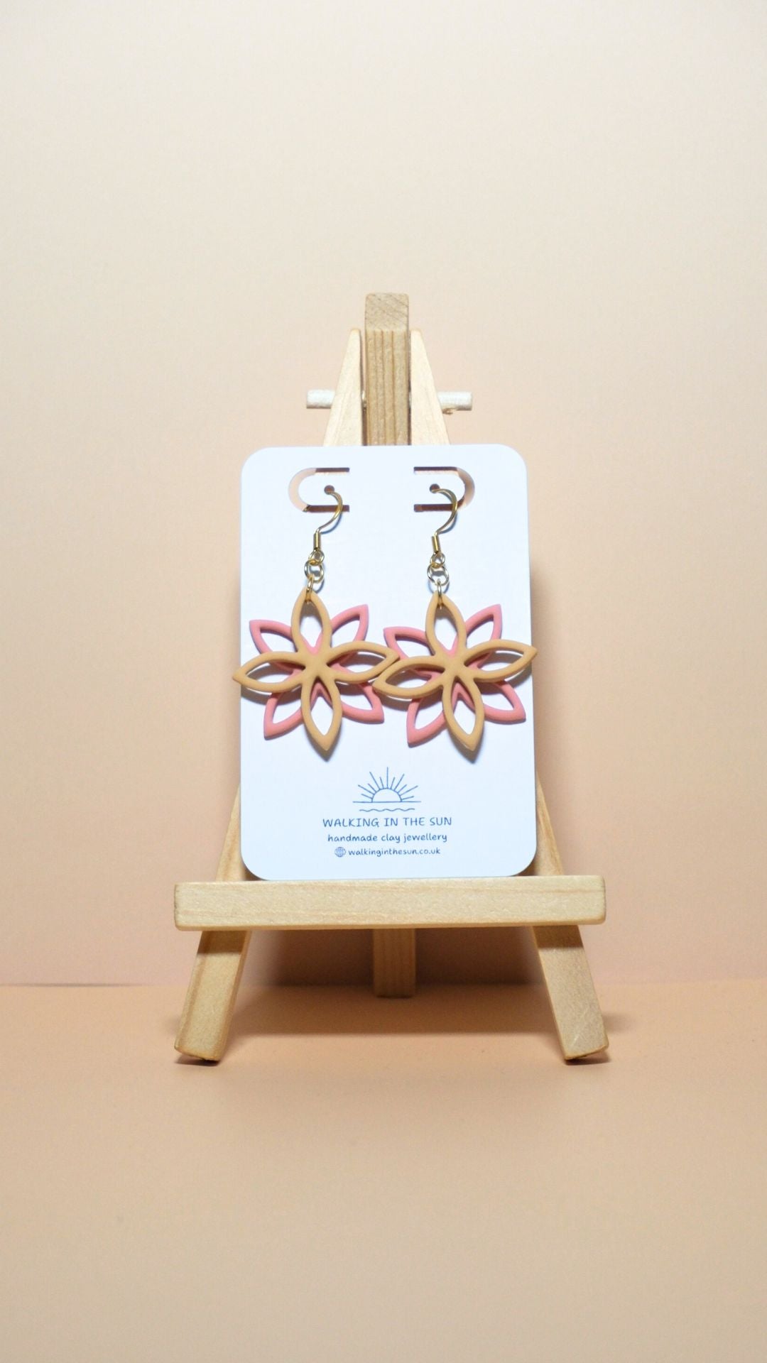 Handmade floral overlap polymer clay earrings in daffodil yellow and peach orange