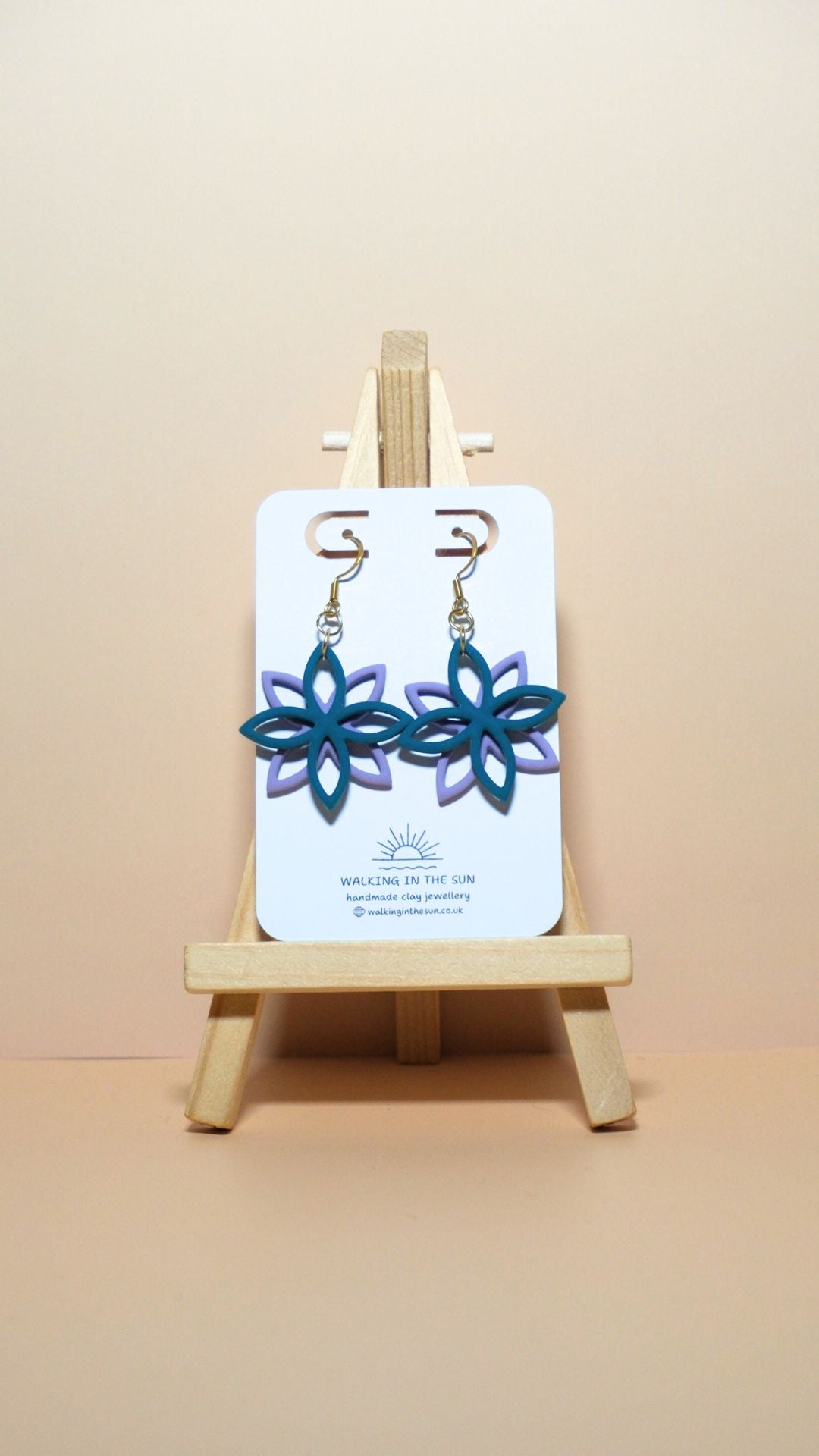 Handmade floral overlap polymer clay earrings in ice blue and orchid lilac