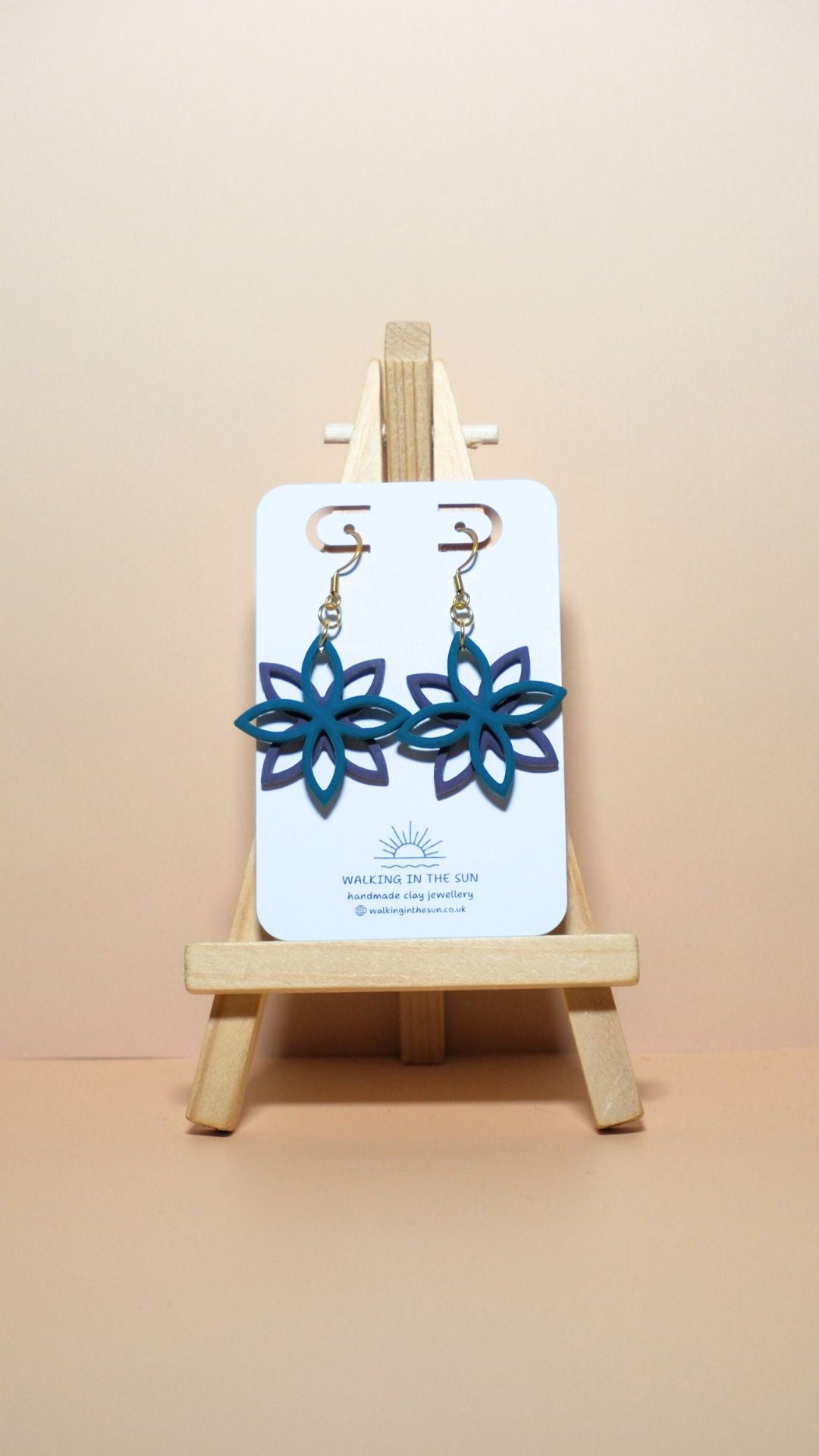 Handmade floral overlap polymer clay earrings in ice blue and plum purple