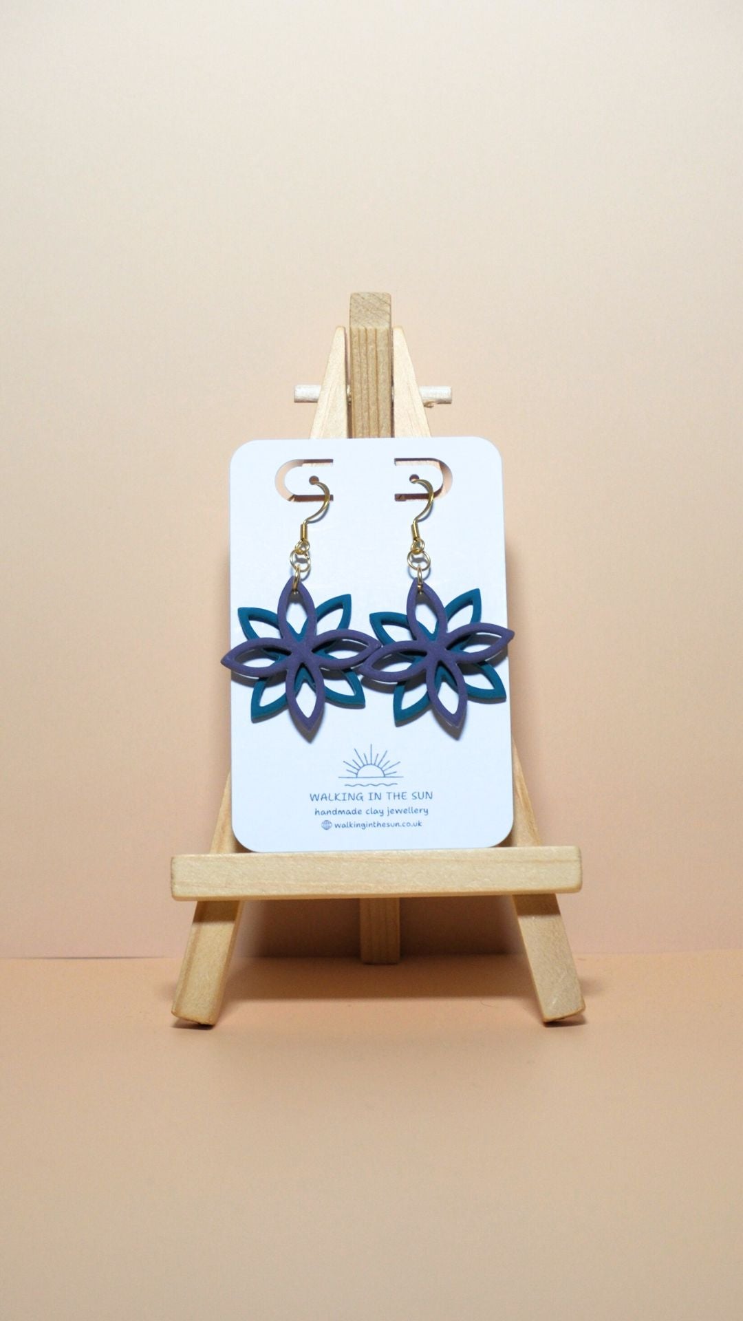 Handmade floral overlap polymer clay earrings in plum purple and ice blue