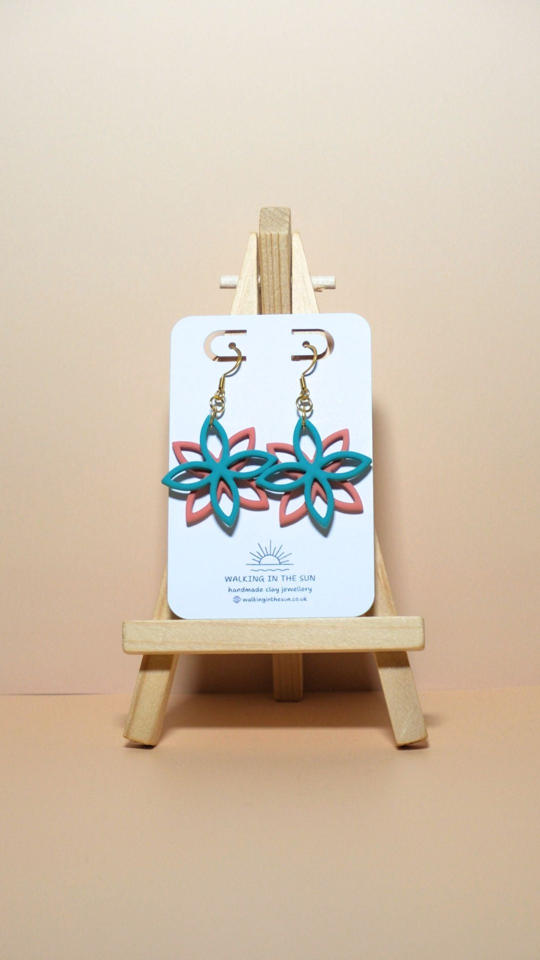 Handmade floral overlap polymer clay earrings in sea blue and coral pink