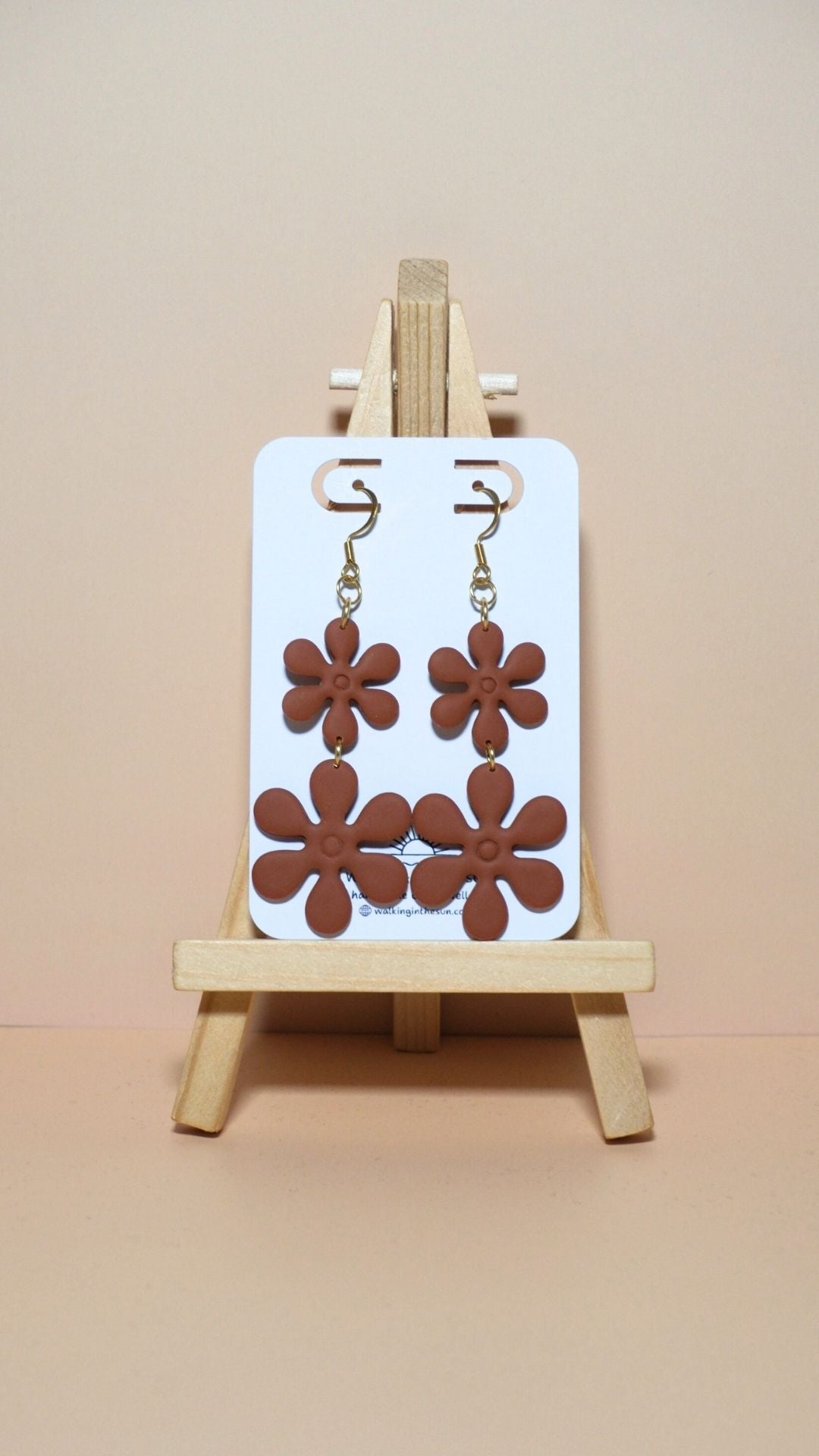 Handmade flower stack polymer clay earrings in burnt orange