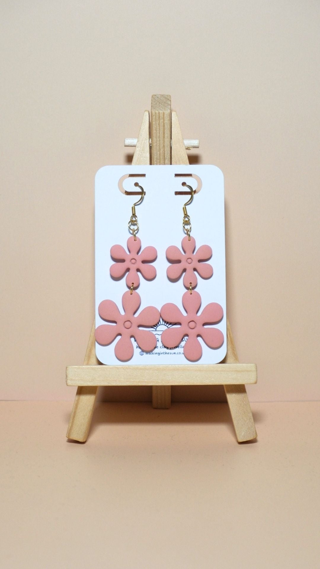 Handmade flower stack polymer clay earrings in peach orange
