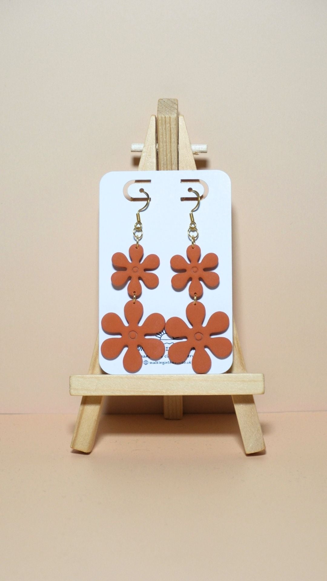 Handmade flower stack polymer clay earrings in sunny orange