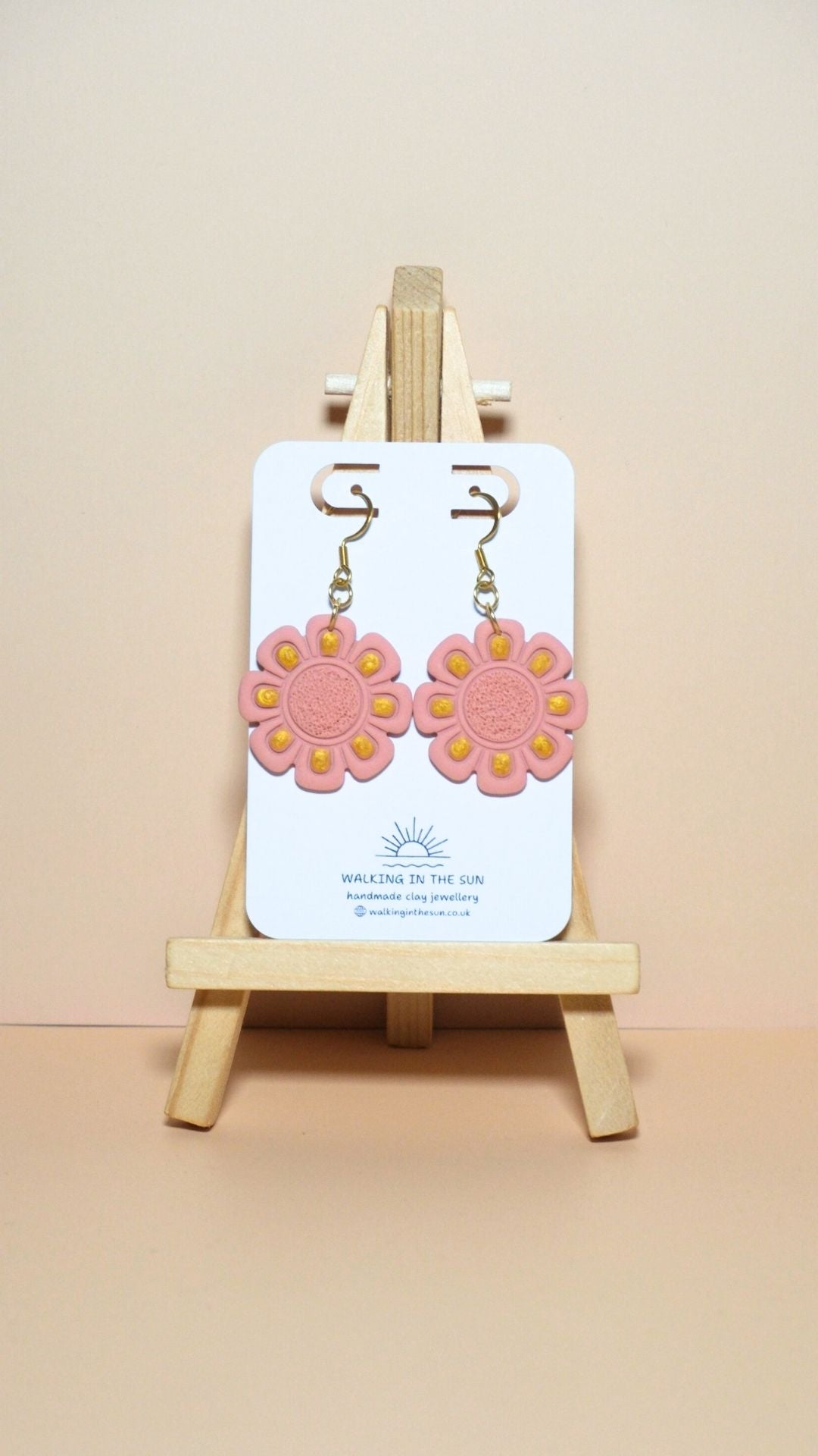 Handmade flower with gold detailing polymer clay earrings in peach orange