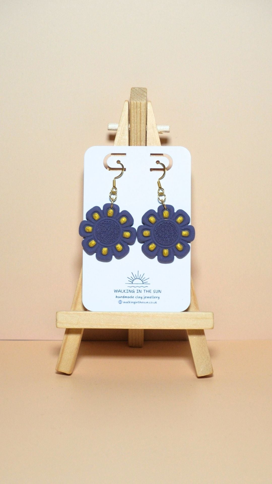 Handmade flower with gold detailing polymer clay earrings in plum purple