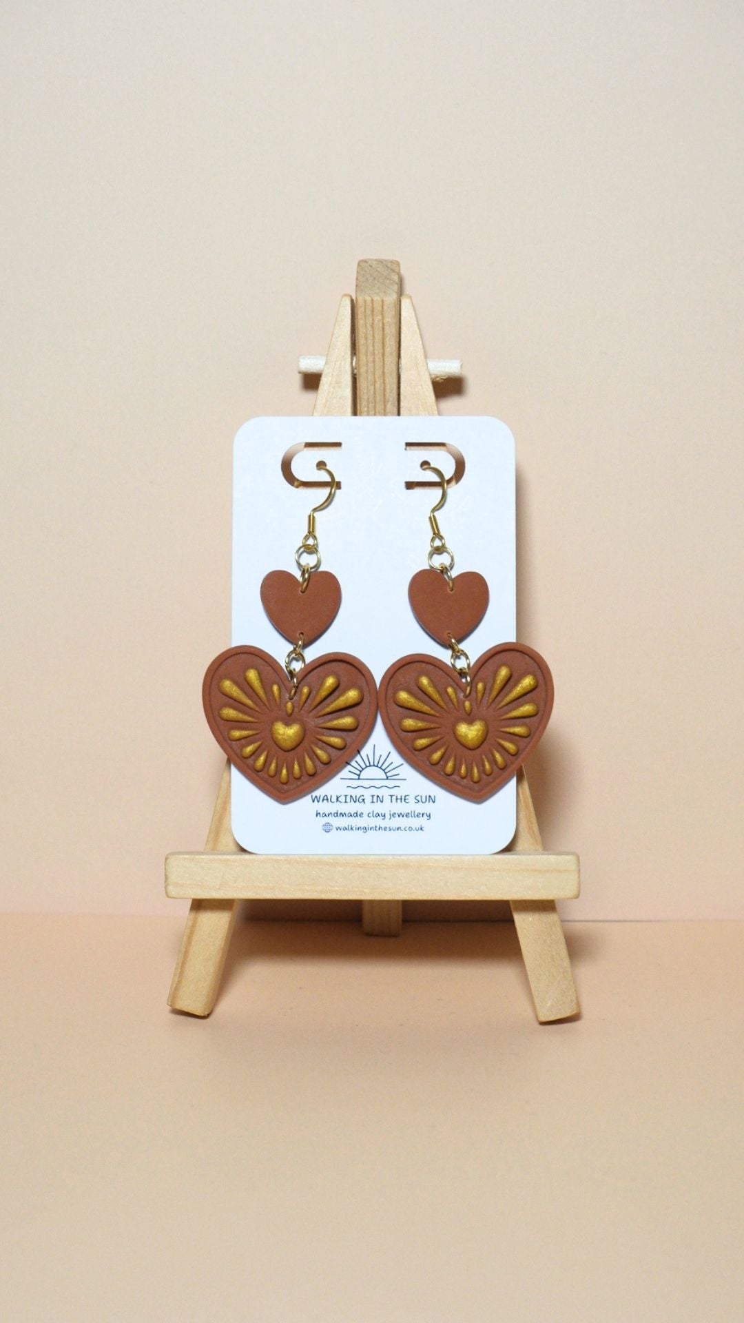 Handmade heart with gold detailing polymer clay earrings in burnt orange