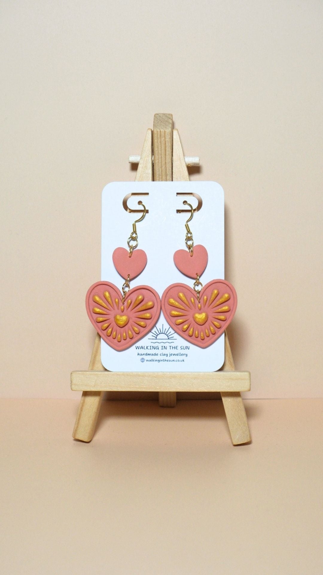 Handmade heart with gold detailing polymer clay earrings in coral pink