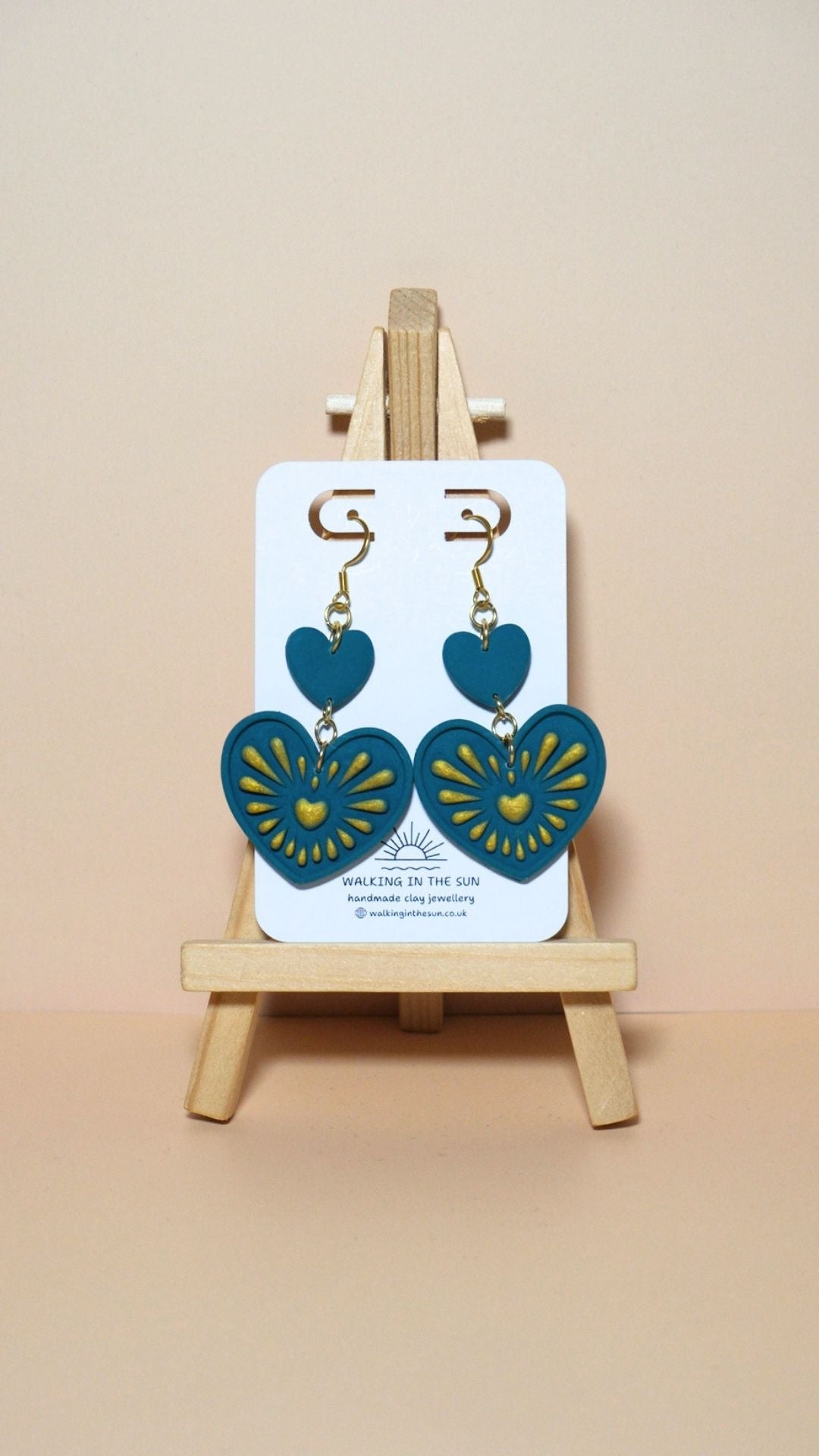 Handmade heart with gold detailing polymer clay earrings in ice blue