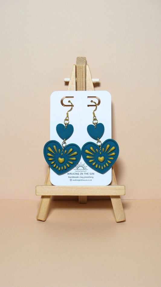 Handmade heart with gold detailing polymer clay earrings in ice blue