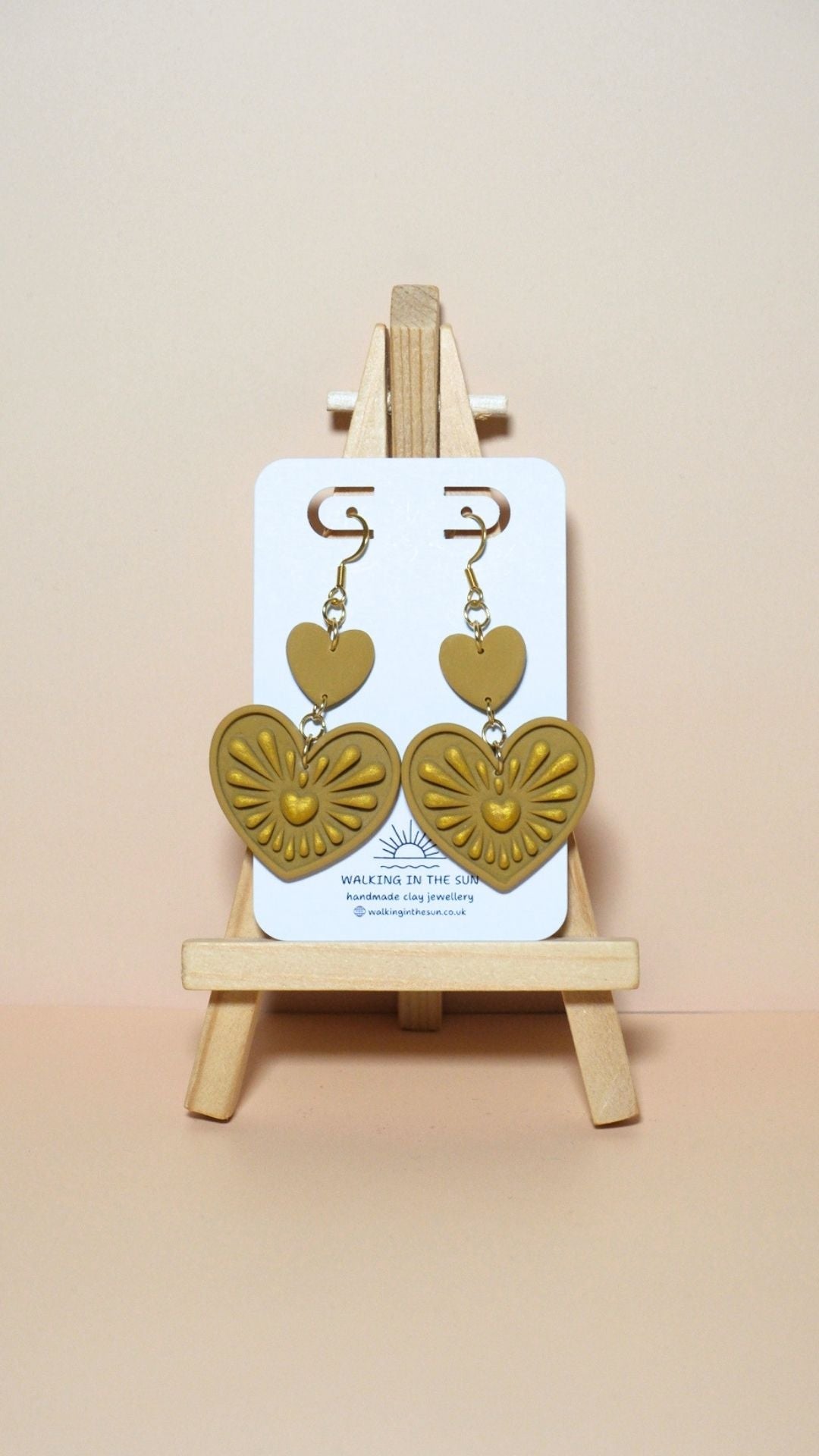 Handmade heart with gold detailing polymer clay earrings in mustard yellow