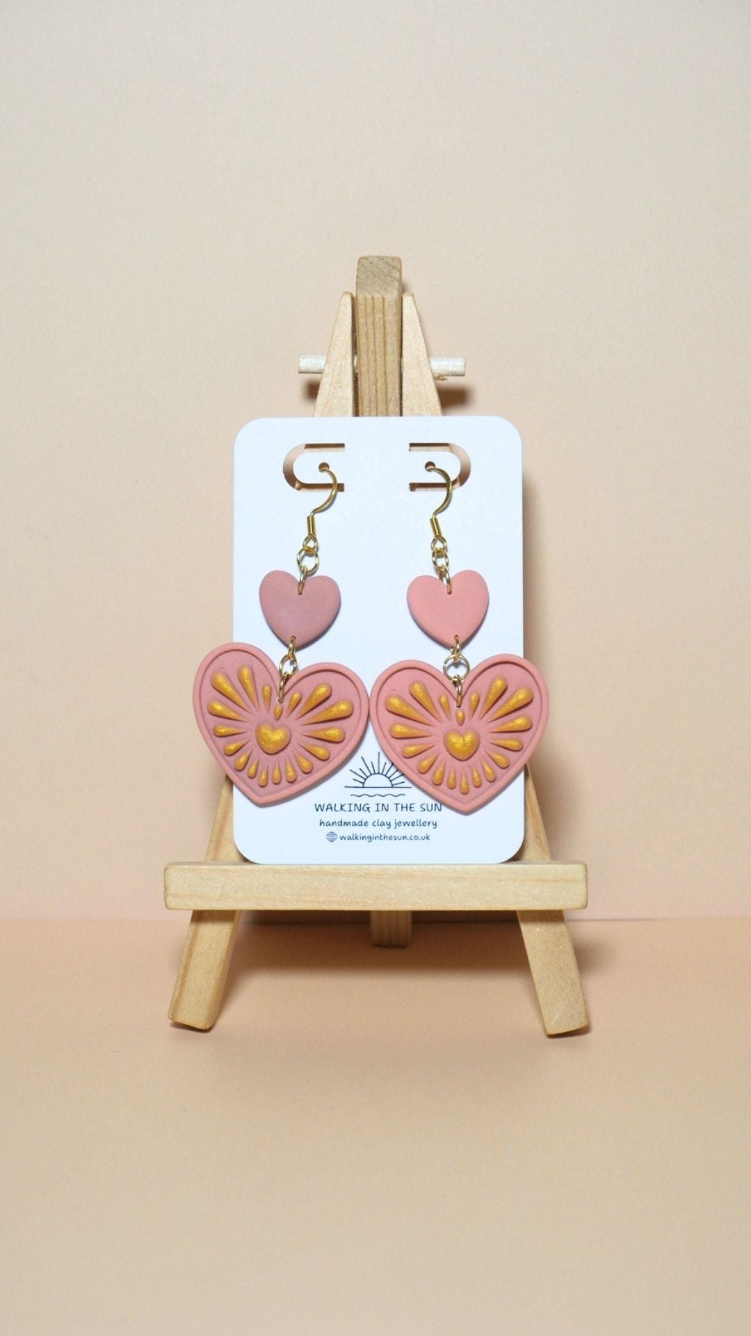 Handmade heart with gold detailing polymer clay earrings in peach orange