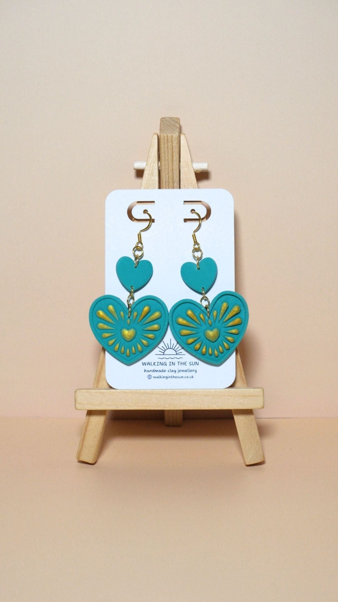 Handmade heart with gold detailing polymer clay earrings in sea blue
