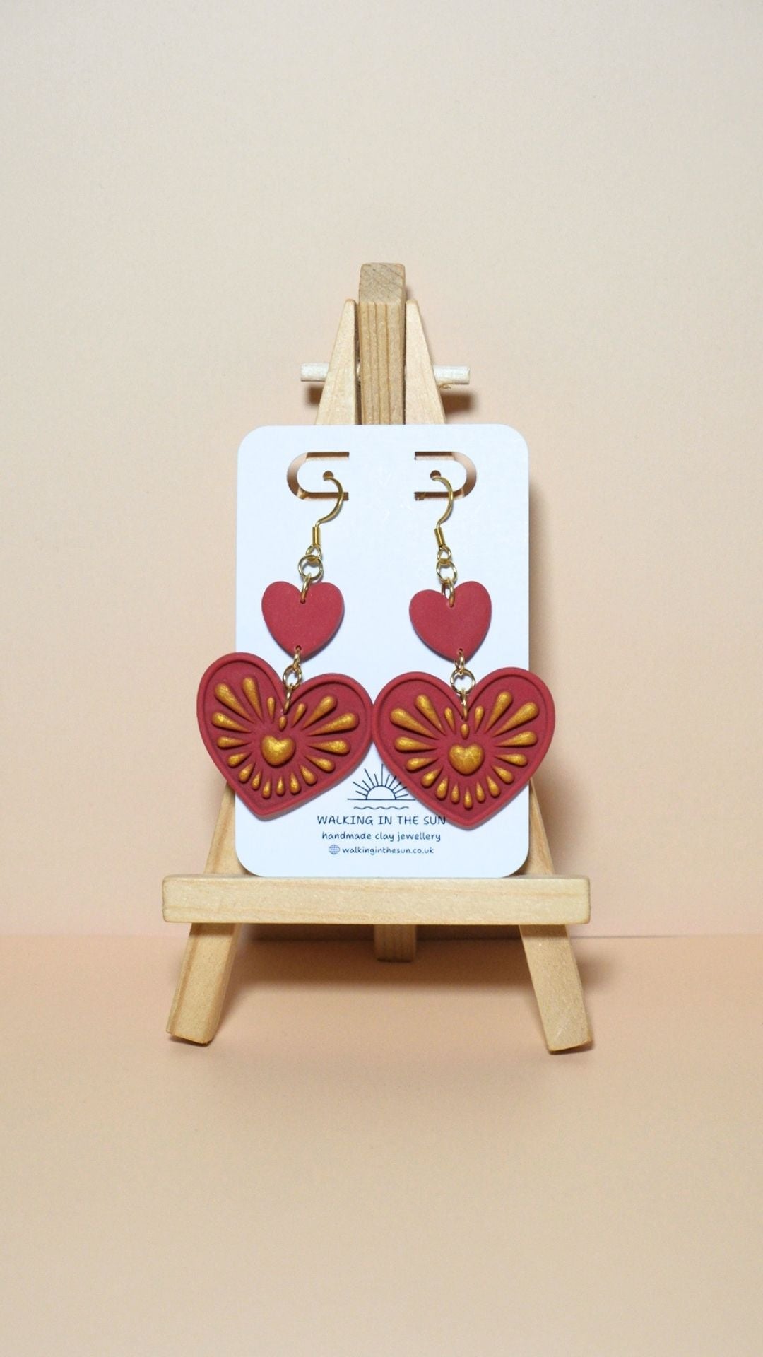 Handmade heart with gold detailing polymer clay earrings in strawberry red