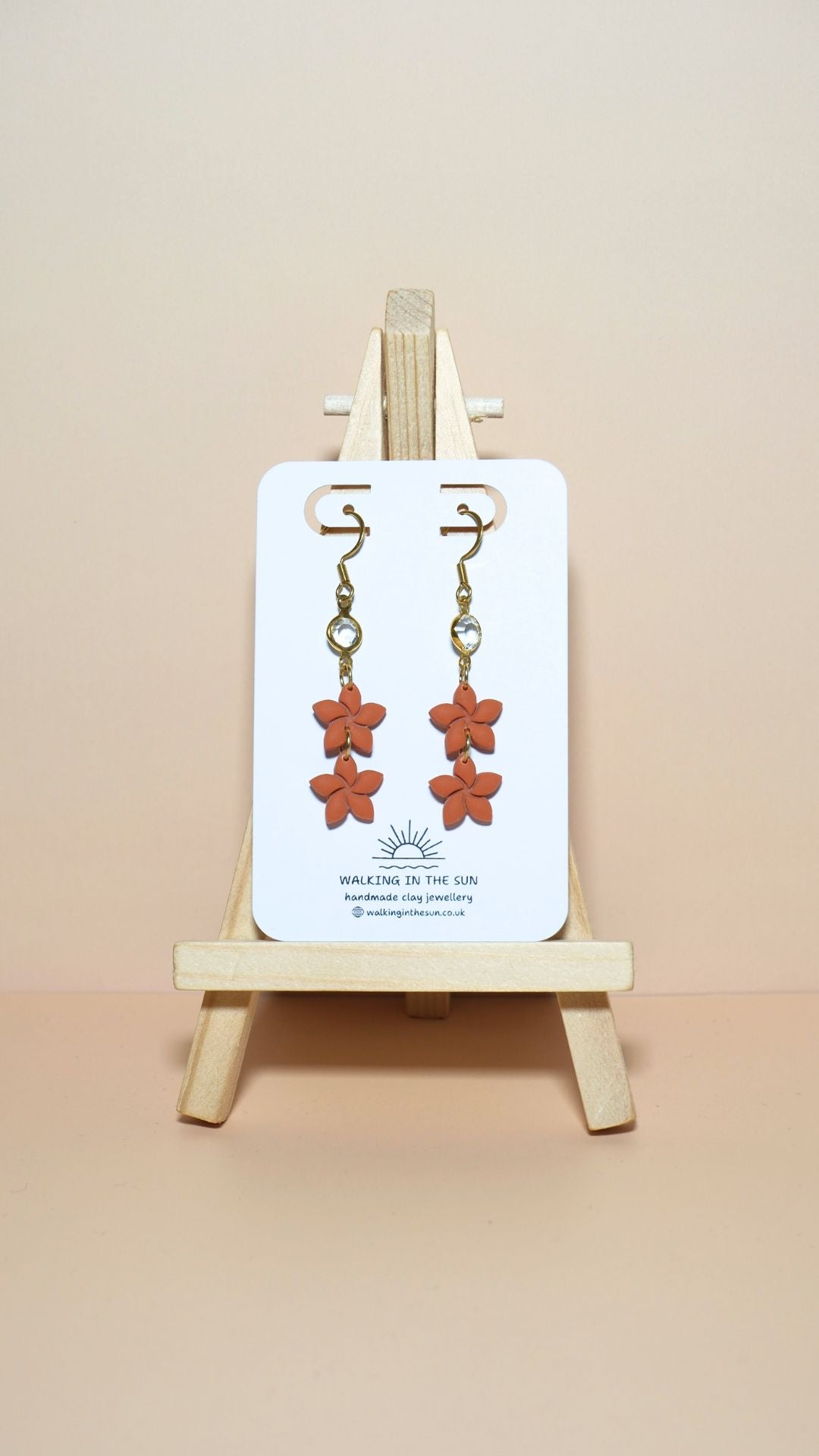 Handmade statement flower stack with gem polymer clay earrings in sunny orange