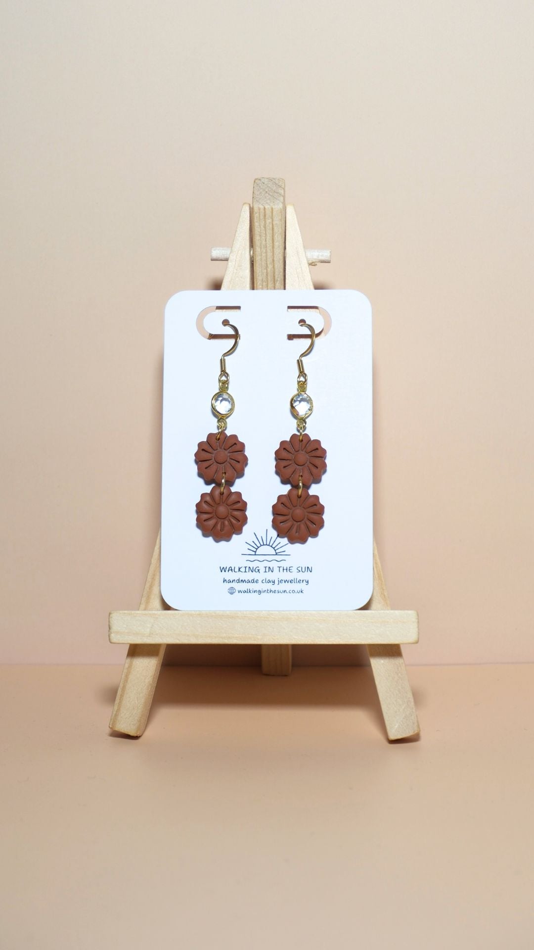 Handmade tiered flower stack with gem polymer clay earrings in burnt orange