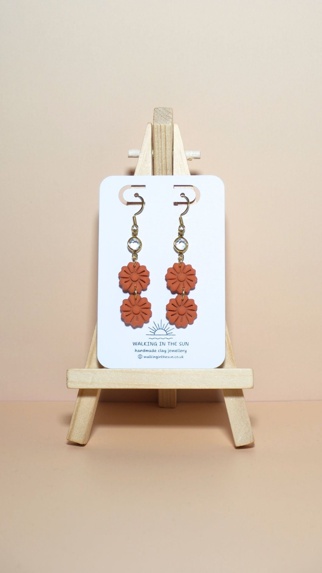 Handmade tiered flower stack with gem polymer clay earrings in sunny orange